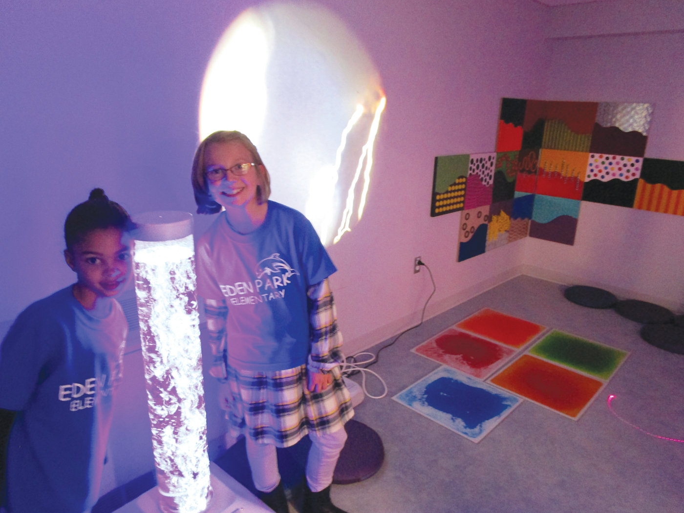 A PLACE TO RECHARGE: Third-grader Sienna Fatorma and fifth-grader Mackenzie Stall had one of the best jobs during the open house – showing visitors the Sensory Room.